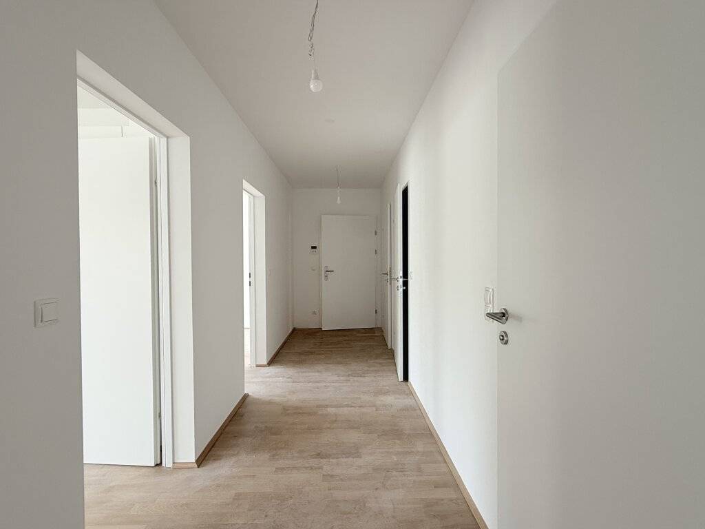 Erstbezug! Schöne Dreizimmerwohnung mit Garten - Ansicht 3