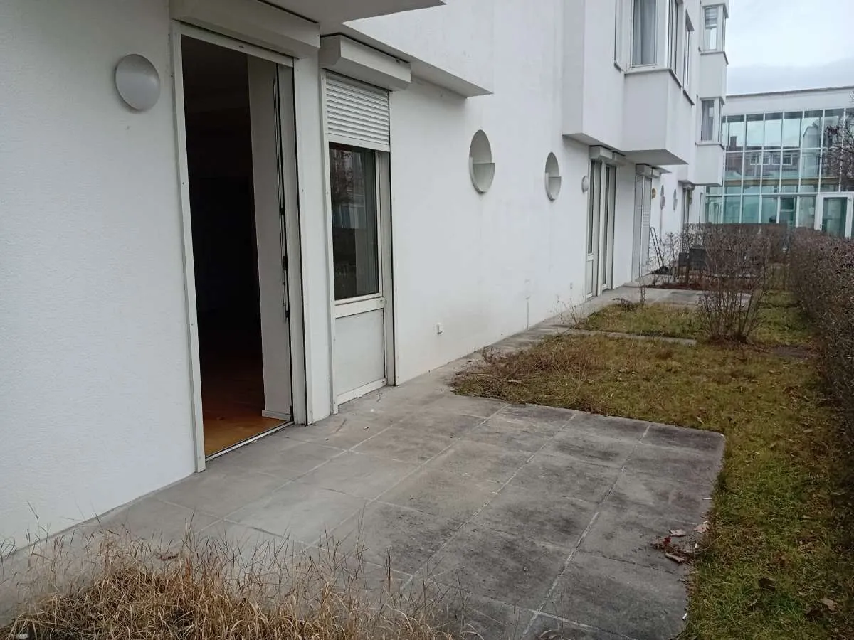 Geräumige 2 Zimmer-Wohnung mit 48m² Eigengarten | Online Terminbuchung - Ansicht 2