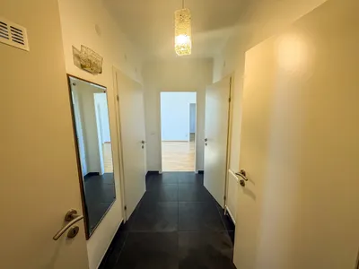 Charmante 2,5 Zimmer Wohnung mit Loggia im 23. Bezirk Wiens – Bild 2