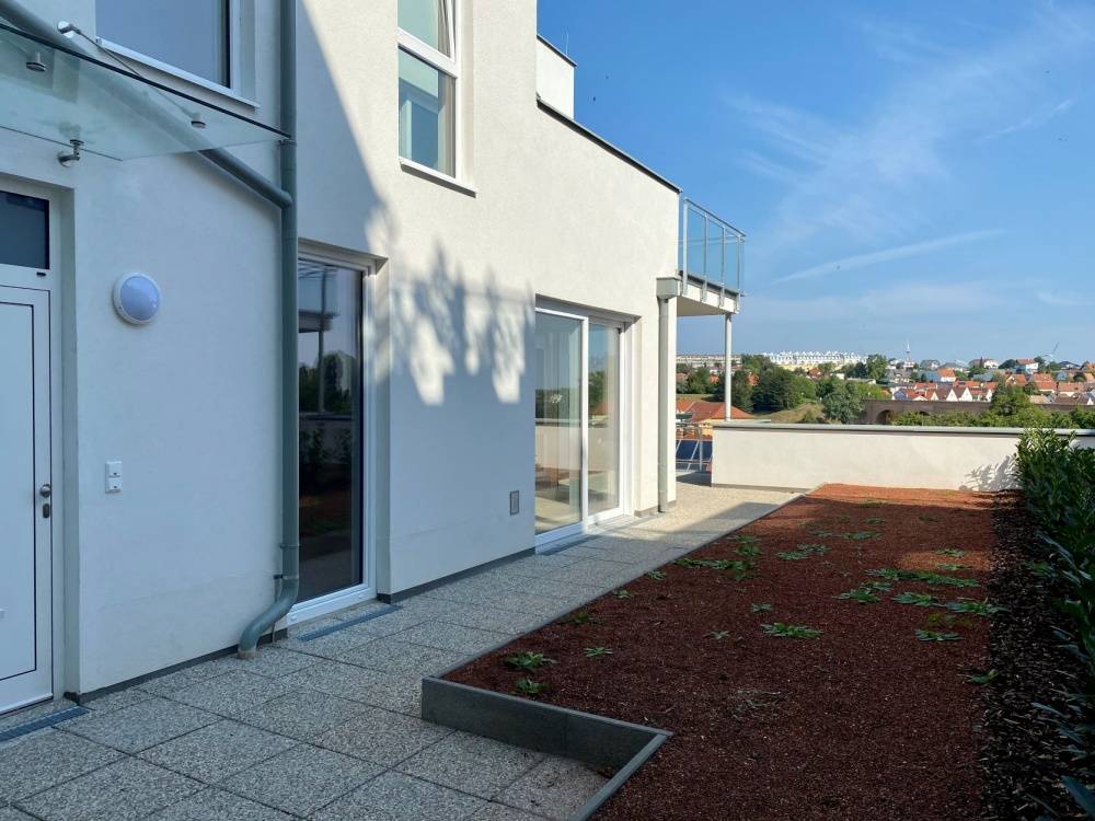 VIERZIMMERWOHNUNG mit GARTEN, TERRASSE, FERNSICHT und ENERGIEOPTIMIERUNG - Ansicht 3