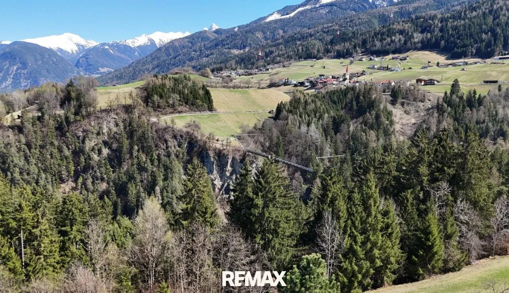 Sonniges Baugrundstück mit zusätzlicher Grünfläche am Waldrand - Aussichtslage in Arzl! - Ansicht 2