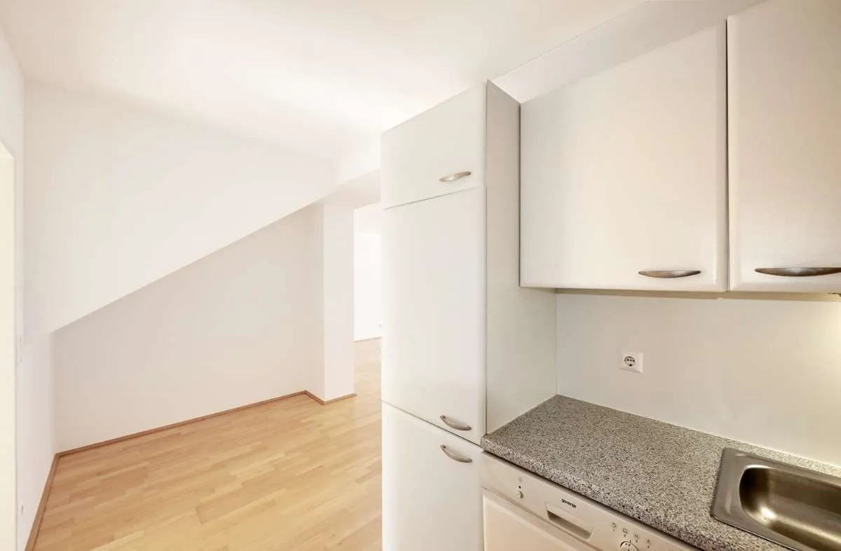 Neubau Living - Traumhafte 1-Zimmer-Wohnung im Dachgeschoss - Ansicht 2