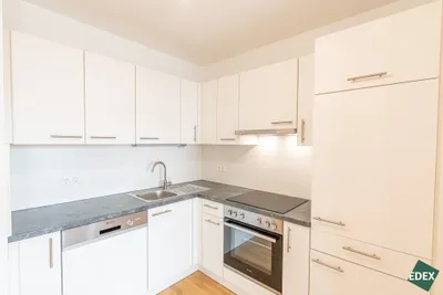 Moderne und helle 2-Zimmer Wohnung mit Loggia nahe Donau – Bild 3