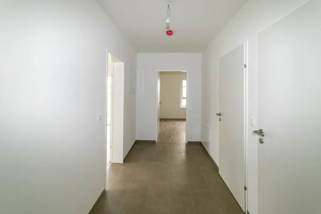 ERSTBEZUG: Erdgeschoßwohnung mit großzügigem Garten - Ansicht 2