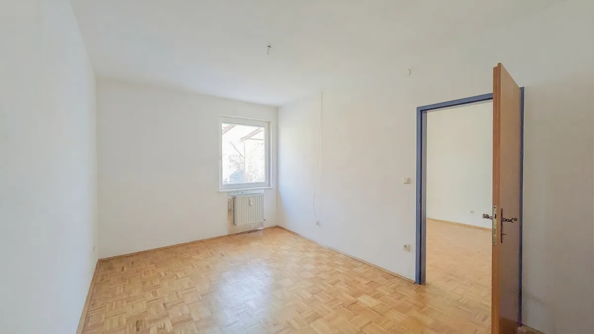 Attraktives Anlageobjekt mit 4 Gartenwohnungen, Garagen, Stellplätzen und Dachbodenausbau - Ansicht 3