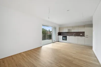 Moderne Erstbezug-Mietwohnungen mit privaten Freiflächen und Garage im 21. Bezirk – Bild 2