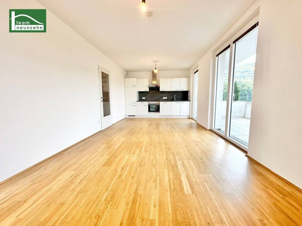 Moderner Wohnkomfort trifft auf grüne Ruhelage - Idyllische 3-Zimmer-Wohnung mit großem Balkon! - Ansicht 2