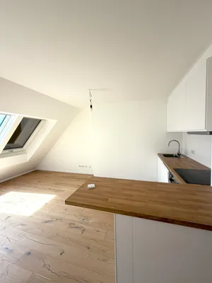 Lichtdurchflutete 2-Zimmer-Dachgeschosswohnung mit traumhaftem Grünblick im 13. Bezirk – Bild 2