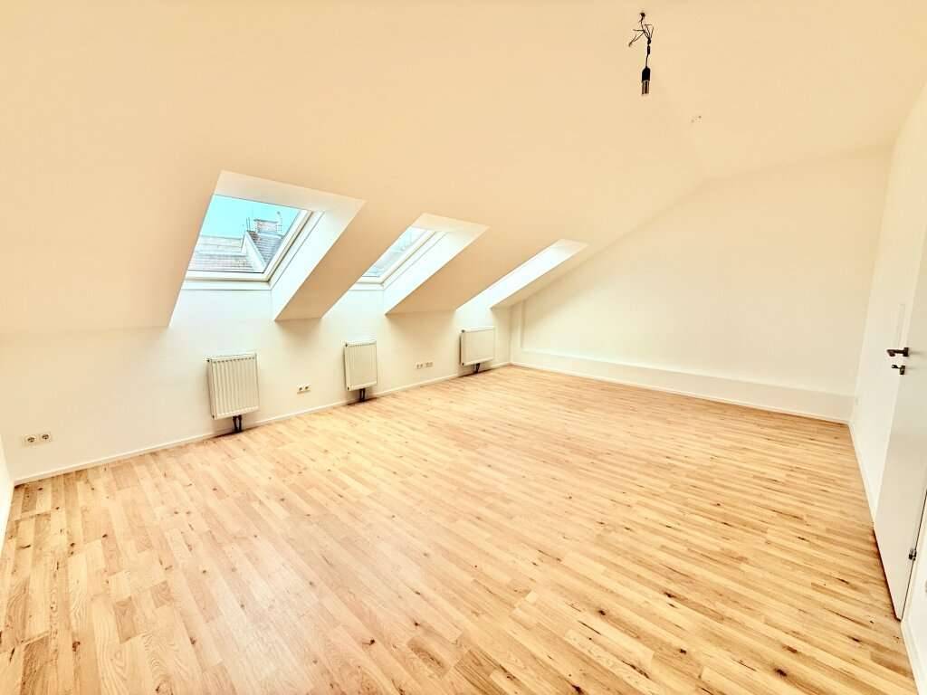 U1 in 5 Minuten erreichbar - Kurzzeitvermietung möglich - Lift im Haus - Zusammenlegung von Wohnungen möglich - Dachgeschoß Ausblick - Ansicht 2