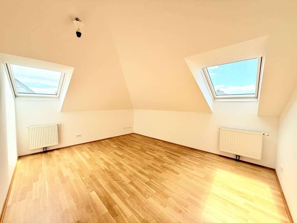 U1 in 5 Minuten erreichbar - Kurzzeitvermietung möglich - Lift im Haus - Zusammenlegung von Wohnungen möglich - Dachgeschoß Ausblick - Ansicht 3