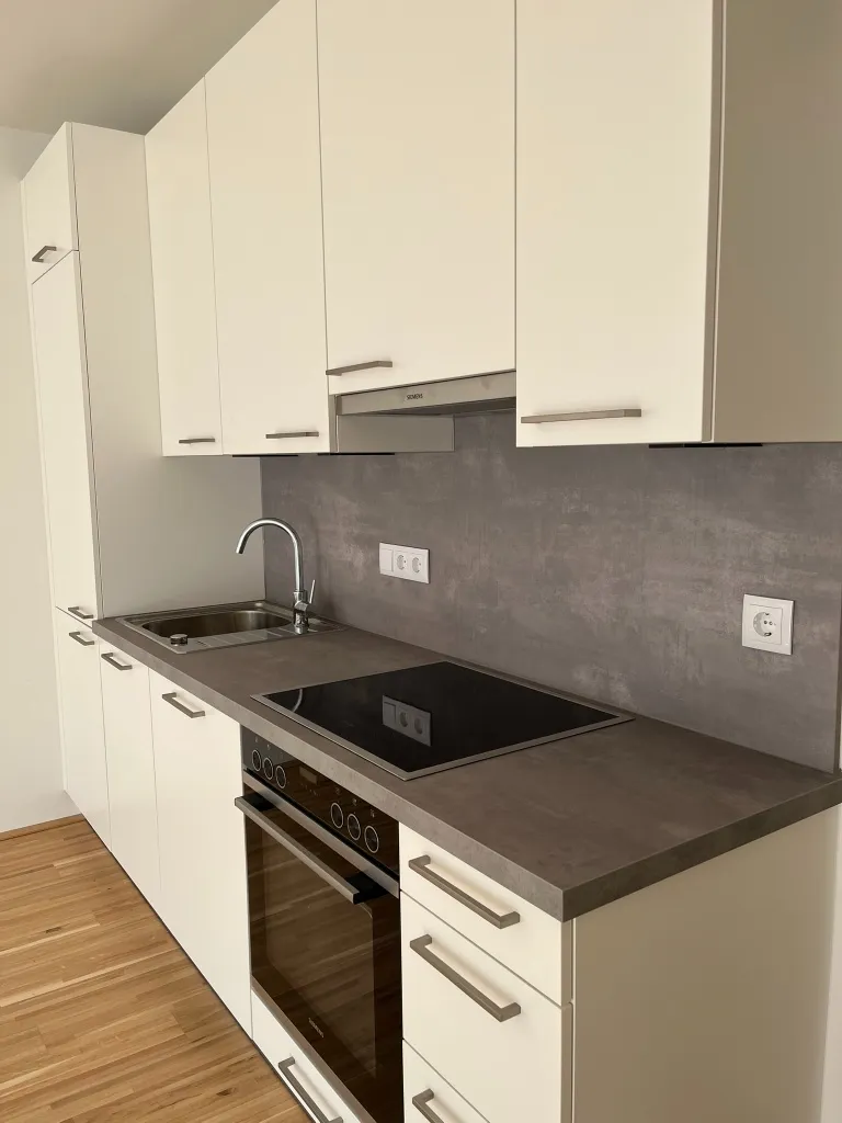 Moderne 2-Zimmer-Erstbezugswohnung mit Balkon 1220 Wien - Ansicht 3