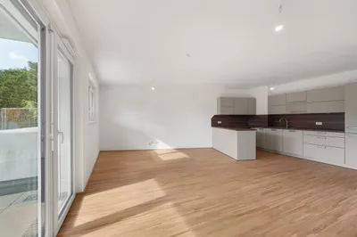 Moderne Erstbezug-Mietwohnungen mit privaten Freiflächen und Garage im 21. Bezirk – Bild 2