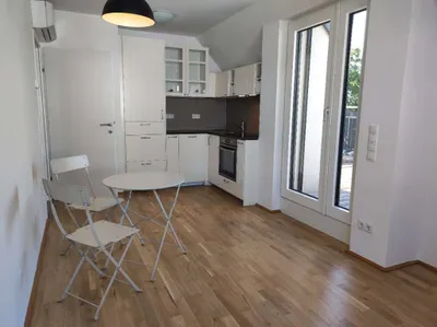 Dachgeschoßwohnung mit zweistöckiger Dachterrasse, INKL. Tiefgaragenplatz – Bild 2
