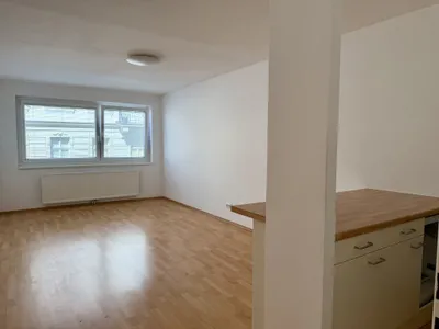 CHARMANTE 1-ZIMMER-WOHNUNG MIT OFFENER KÜCHE IN PERFEKTER LAGE – Bild 3