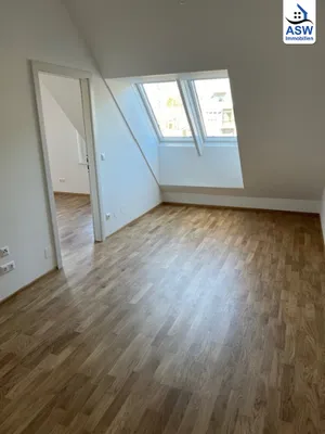 Attraktive 2-Zimmer Dachgeschosswohnung mit Terrasse nahe U1 – Bild 3