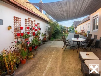 8-Zimmer-Haus kaufen in Bruck an der Leitha – 195,06 m², € 390.000 – Bild 2 von 25