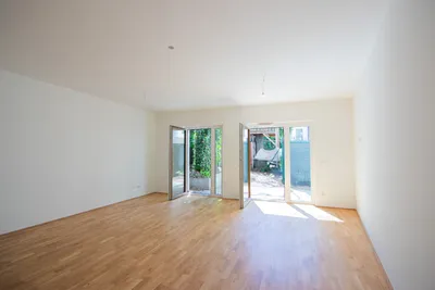 Moderne Neubauwohnung mit Terrasse & Eigengarten