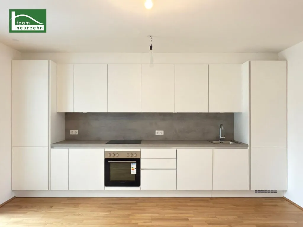Hochwertige Erstbezugs-Anlegerwohnung mit großem Hof-Balkon und Küche nahe Schönbrunn! - Ansicht 3
