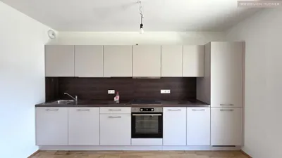 Q11: Single-Wohnung mit großem Balkon + Deckenkühlung // 2.OG