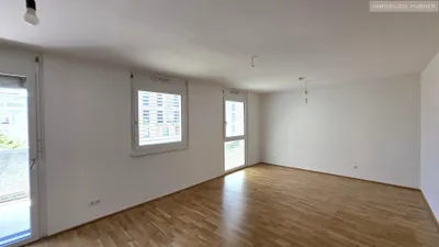 Q11: Single-Wohnung mit großem Balkon + Deckenkühlung // 2.OG – Bild 3