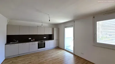 Q11: Single-Wohnung mit großem Balkon + Deckenkühlung // 2.OG – Bild 2