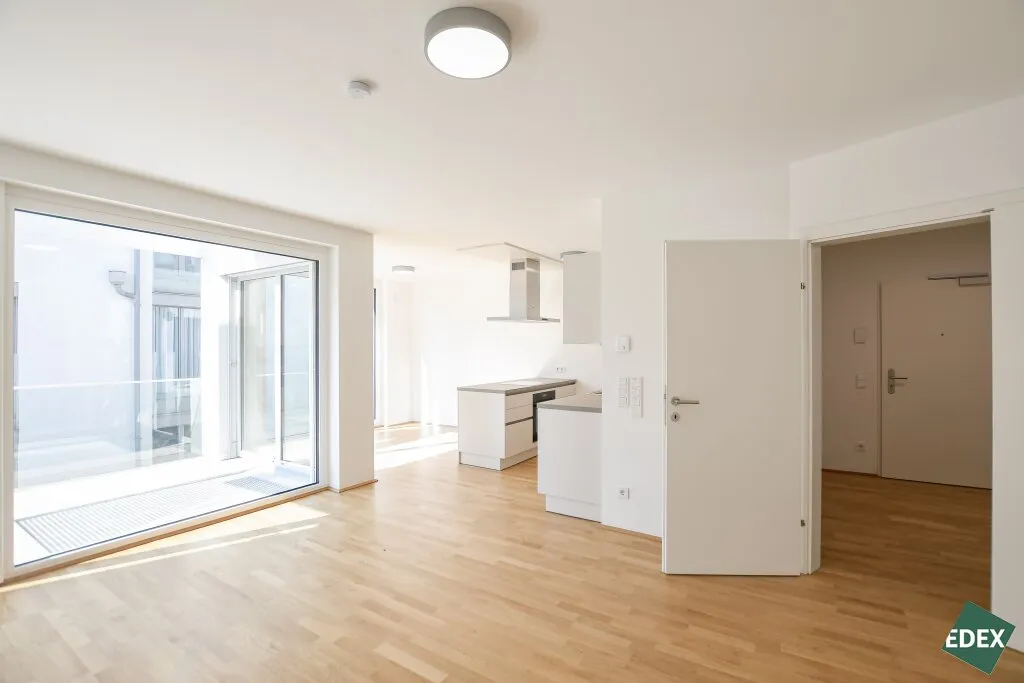 Erstbezug mit Stadtblick: Schöne 3-Zimmer-Wohnung mit Terrasse und moderner Ausstattung - Ansicht 2