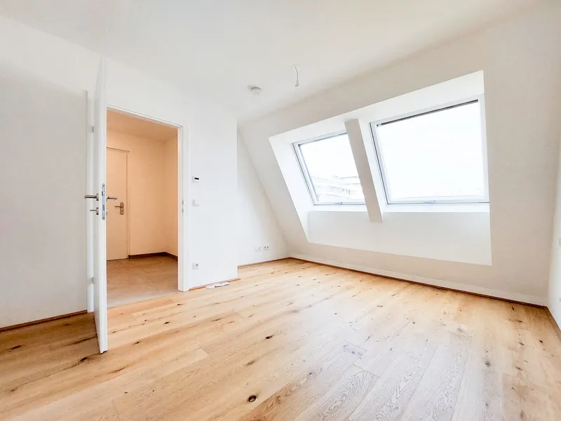 Modernes Dachgeschoss mit 2 Zimmer, Balkon und der Alten Donau vor der Haustüre - Ansicht 3