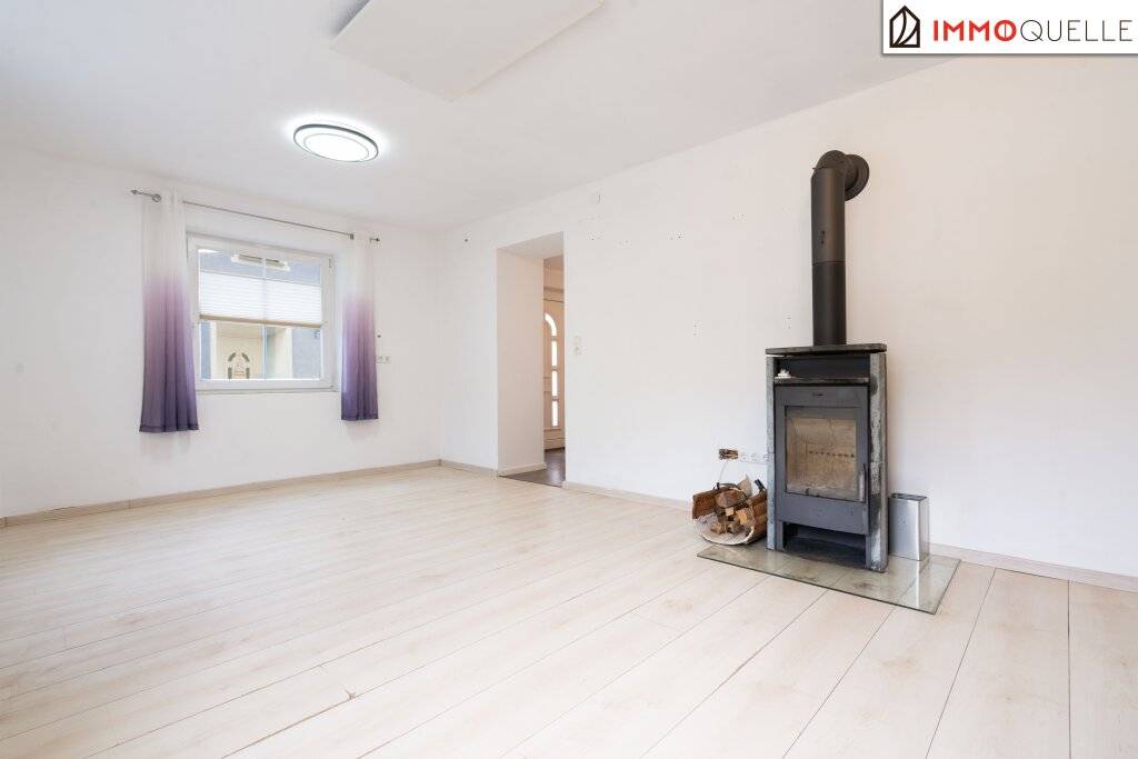 Ein Wohngefühl zum Ankommen - Sonnige 2-Zimmer-Wohnung mit ca. 70 m² Wohnfläche, geräumiger Wohnküche, großem Schlafzimmer und geschütztem Allgemeingarten - Ansicht 2
