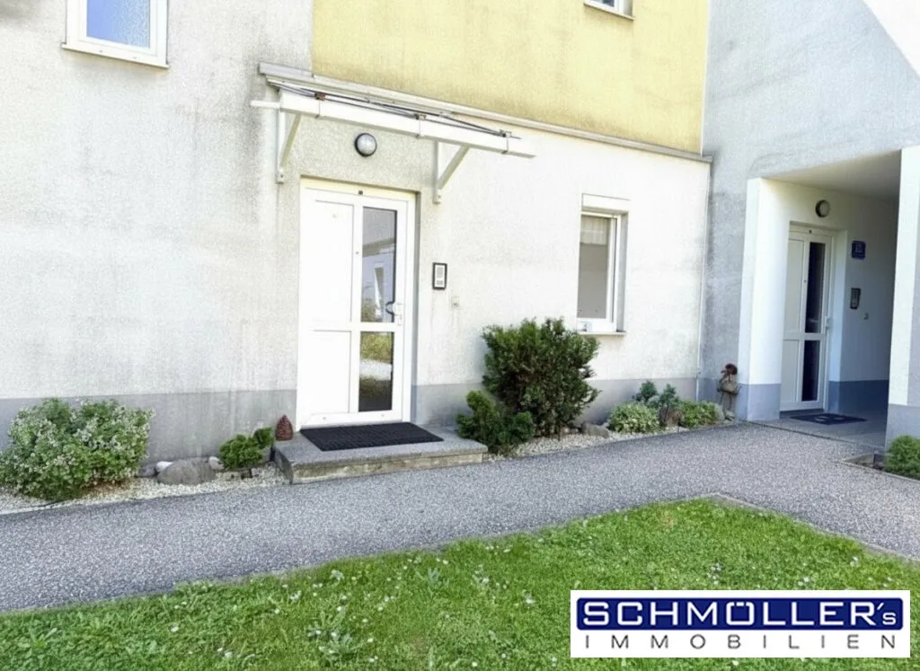 Garten-Wohnung mit Hauscharakter in zentraler Lage - Ansicht 2