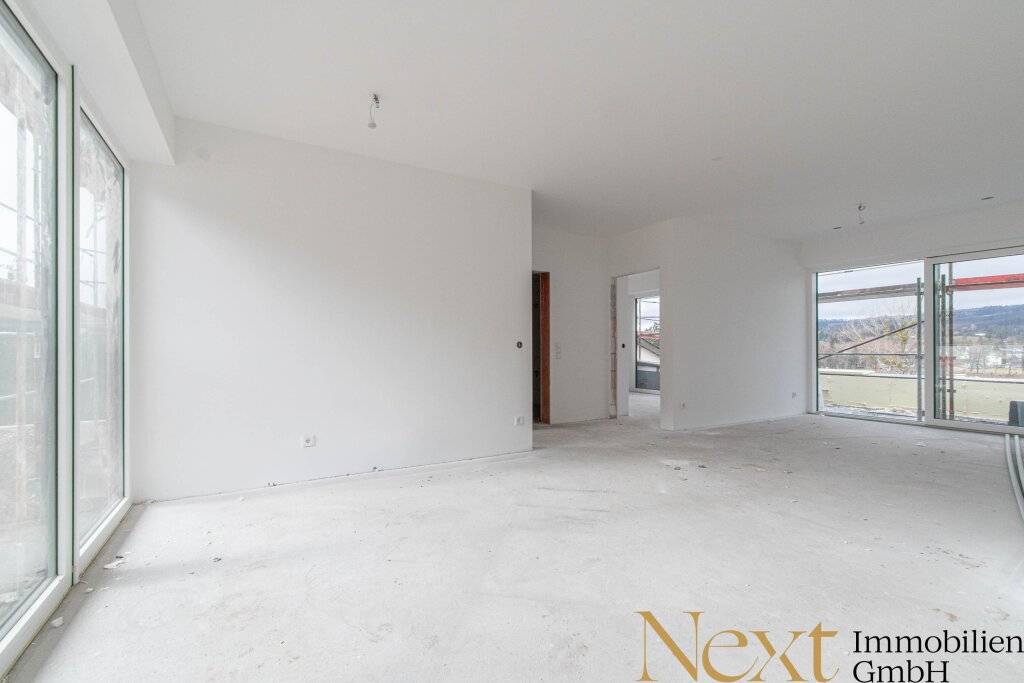 ERSTBEZUG! Traumhafte 4-Zimmer-Wohnung mit herrlichem Donaublick mit Eigengarten & Terrasse zu verkaufen! - Ansicht 3