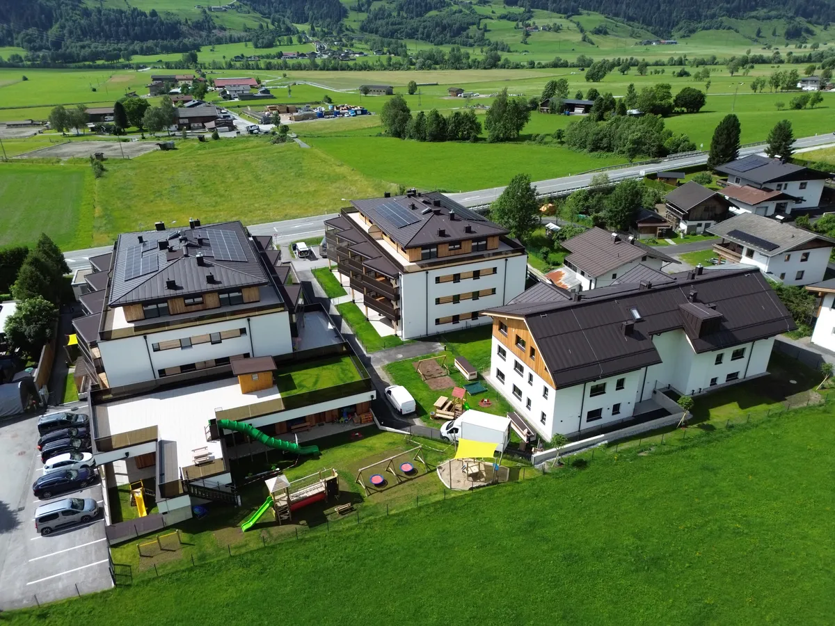 Massivholzbau "Lebensraum Waidach" Piesendorf Haus B Top 01 - Ansicht 3
