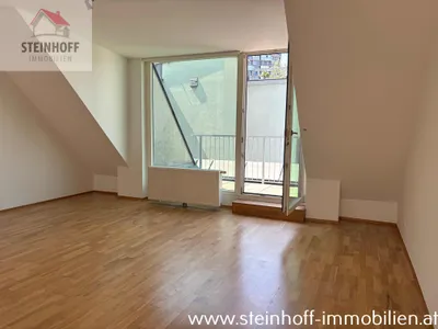Dachgeschosswohnung mit Balkon und Klimaanlage, unbefristet – Bild 2