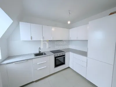 Helle Dachgeschosswohnung mit Charme und Ruhelage – Bild 3