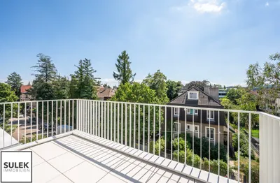 Klimatisierte Dachgeschosswohnung mit Büroraum & 16 m² Balkon | VILLMA - Top 6 – Bild 2
