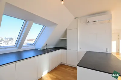 Exklusive Dachgeschoß-Maisonette mit Dachterrassen & Pool am Dach – Bild 2