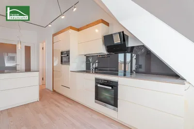 Wohnen über den Dächern der Landstraße - Seltene Dachgeschosswohnung mit Terrasse, Sauna, Fitnessraum & Garagenplatz – Bild 2