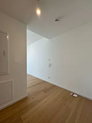 (reserviert) Erstbezug: Luxus-Smart-Home, Moderne Einbauküche inkl. alle E-Geräten, Balkon, Donaublick, Panorama über Wien,|Rooftop-Pool, Sauna, Fitness. Ideal für Paare, Expats, internationale Fachkräfte. Bruttomiete inkl. BK 1390€ - Keine Maklerprovision – Bild 2