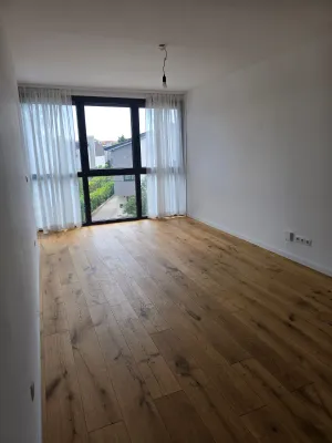 MODERNE 2-ZIMMER BALKONWOHNUNG & TIEFGARAGENPLATZ – Bild 2