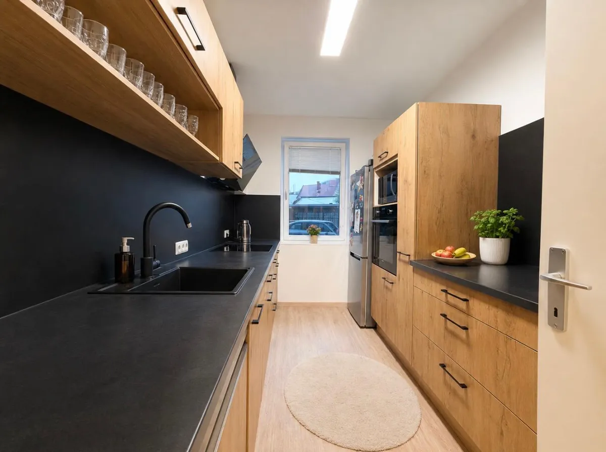 Schöne Gartenwohnung - zentrumsnah - doch ruhig - Tiefgaragenplatz - Ansicht 3