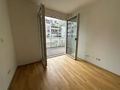 Helle Neubauwohnung mit großem Balkon und Garage, direkt bei der U3 – Bild 3