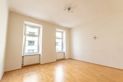 Charmante Altbauwohnung mit Balkon in ruhiger Lage - 2 Zimmer, ca. 58 m² – Bild 2