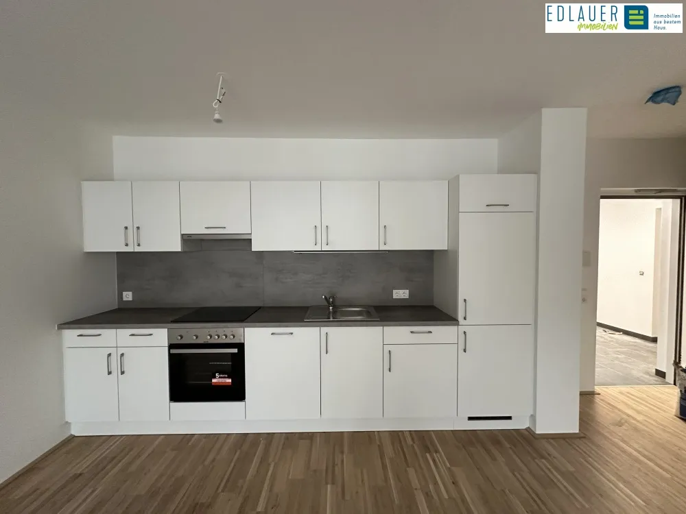 2-Zimmer-Neubauwohnung mit Balkon - Stadthaus zum Fluss! - Ansicht 3