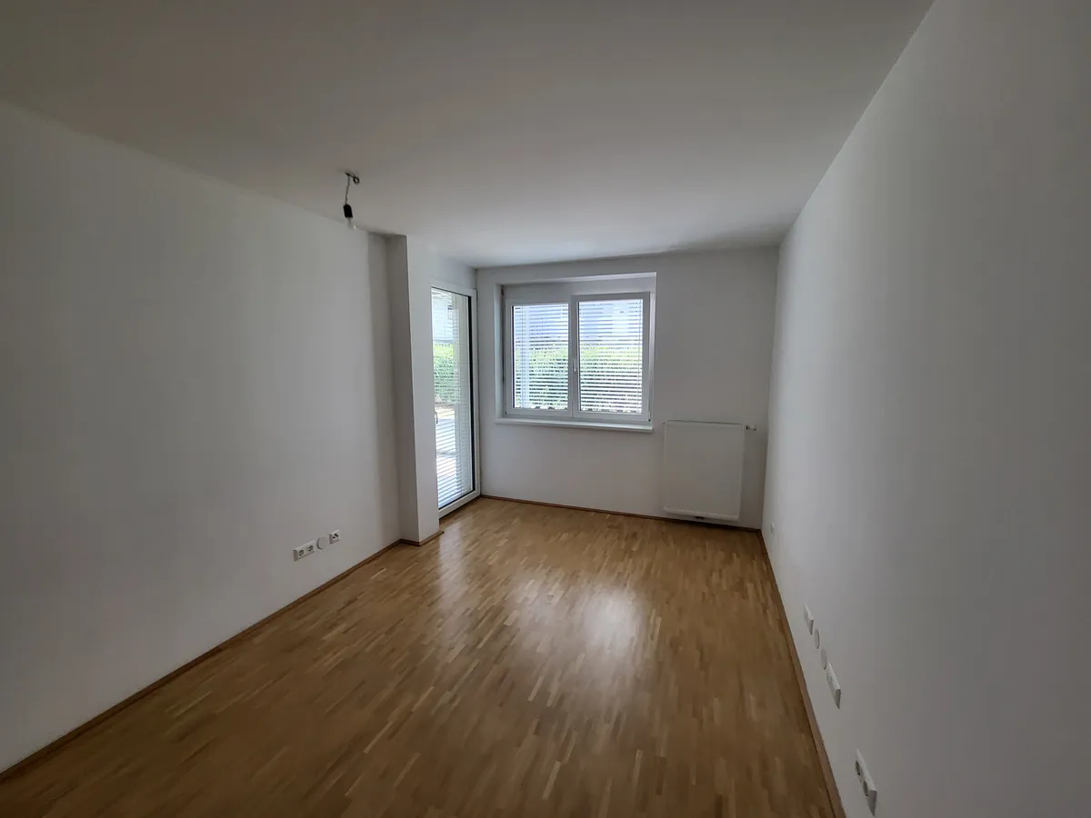 Geförderte Gartenwohnung in ruhiger Wohnsiedlung! Mit Tiefgarage! - Ansicht 3
