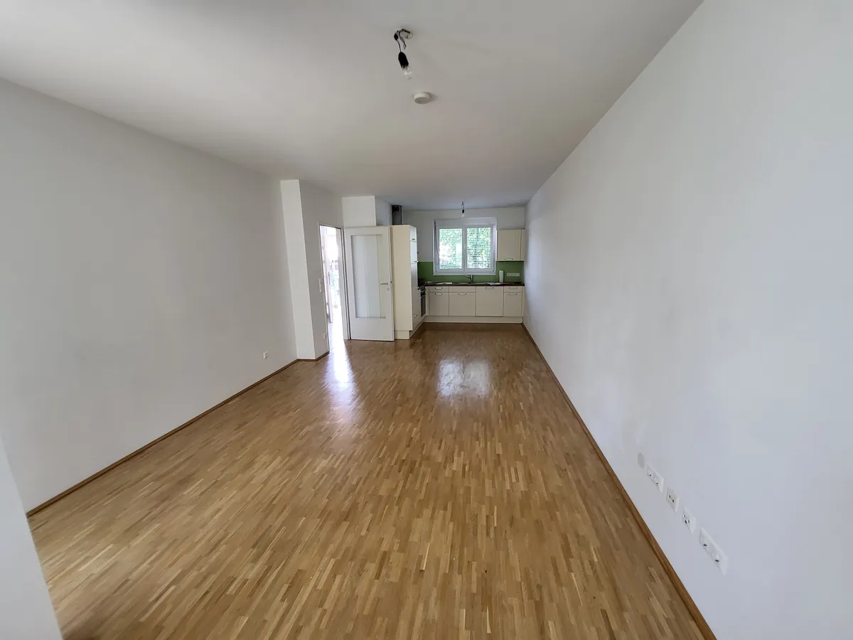 Geförderte Gartenwohnung in ruhiger Wohnsiedlung! Mit Tiefgarage! - Ansicht 2
