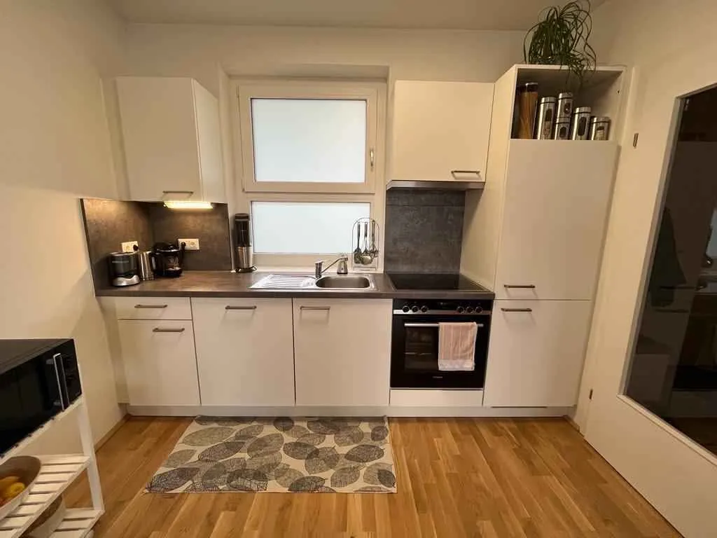 **Helle 3-Zimmer Wohnung mit Eigengarten, Terrasse und Garagenplatz** - Ansicht 3