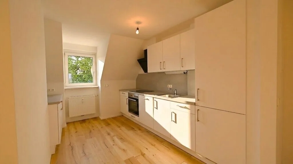 Offen gestaltete DG-Wohnung mit herrlichem Ausblick und Einbauküche! - Ansicht 2