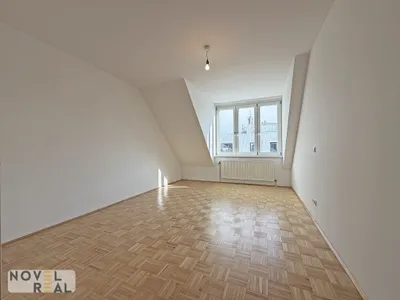 Sonnige 2 Zimmer Dachgeschoss Wohnung mit großzügigem Wohnbereich – Bild 2