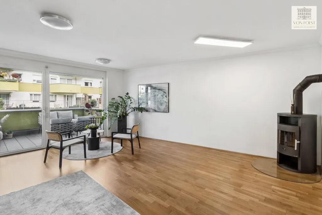 Charmante NEUBAU-WOHNUNG mit großzügiger Terrasse in zentraler Grün-Ruhelage - Ansicht 2