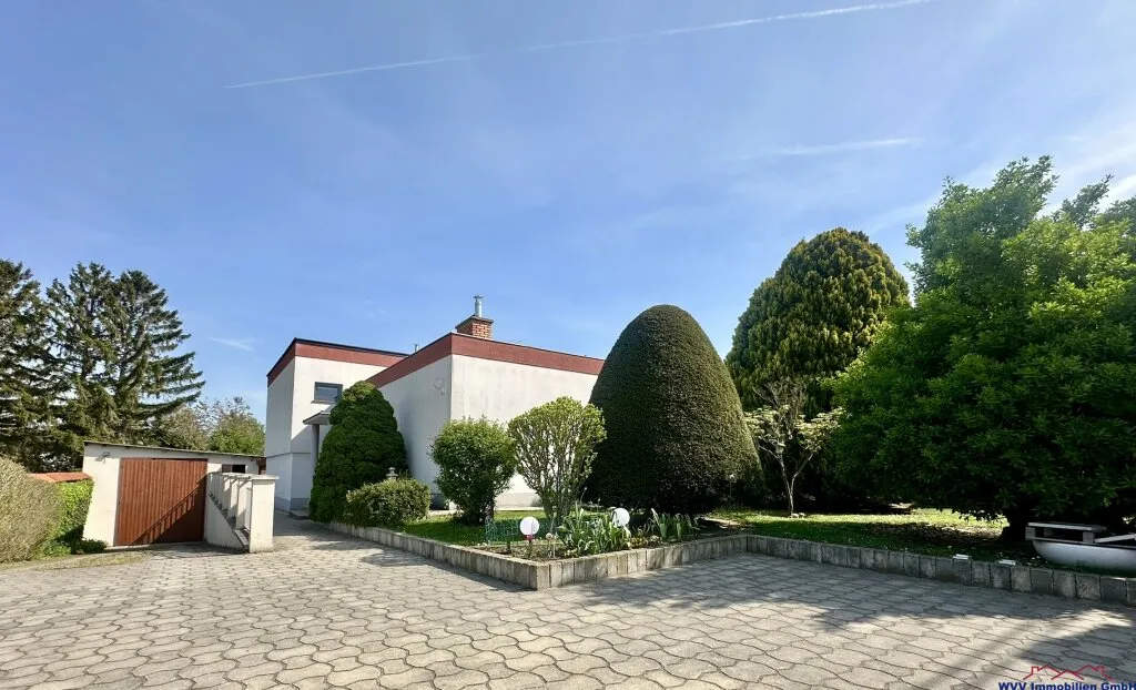 Seltene Gelegenheit: Familienhaus mit Profiwerkstatt & großem Grundstück - Ansicht 2