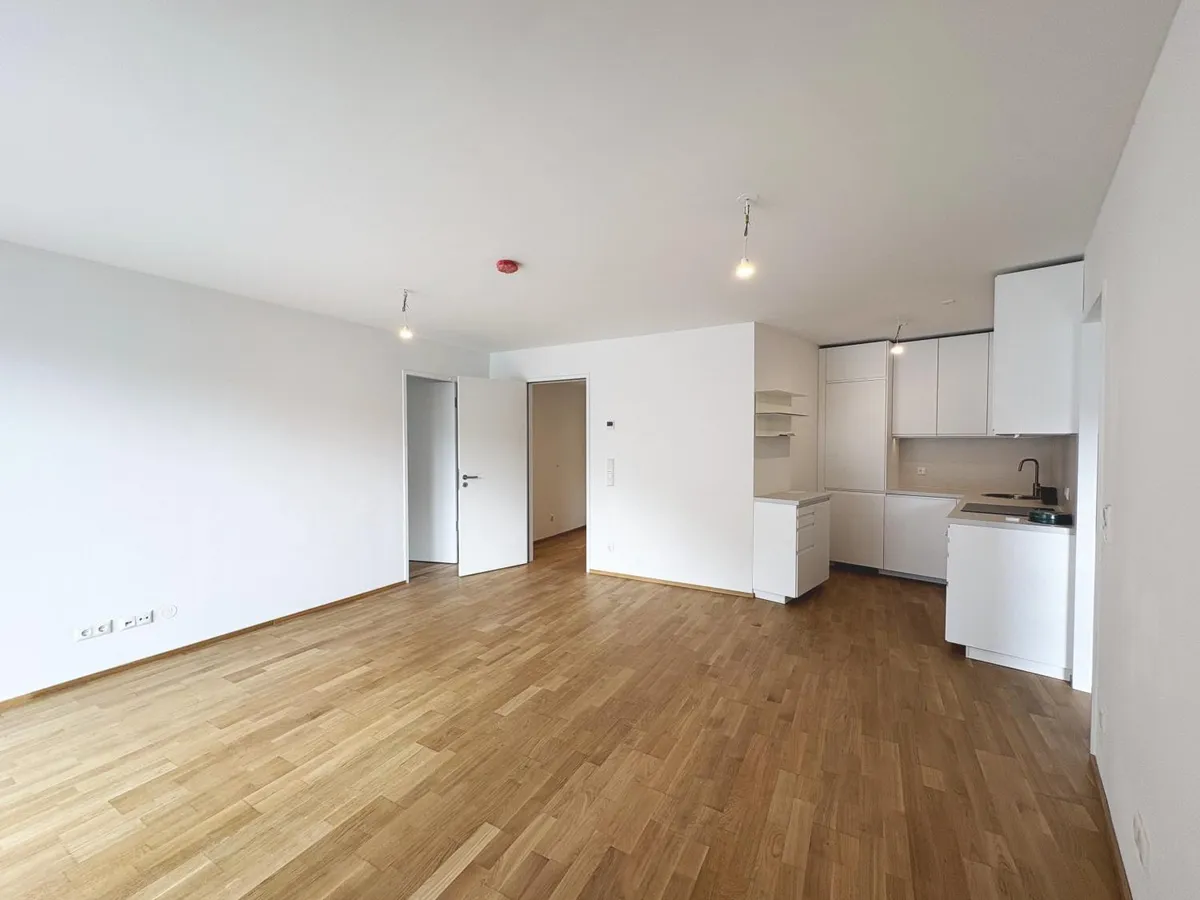 Hochwertiger Erstbezug im 18. - Tolle 3 Zimmer Wohnung mit Balkon und Garagenstellplatz - Ansicht 2
